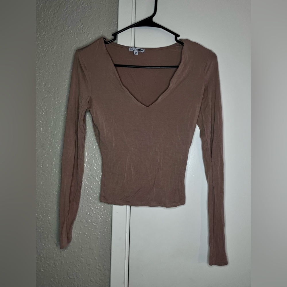 Brown long sleeve v neck top.
